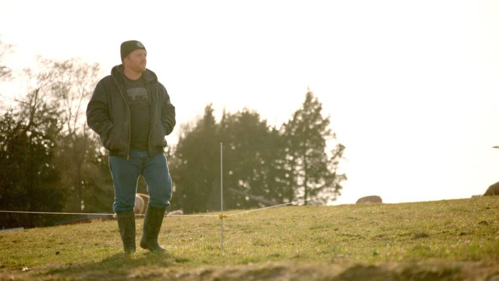 Mike Marseden standing in field